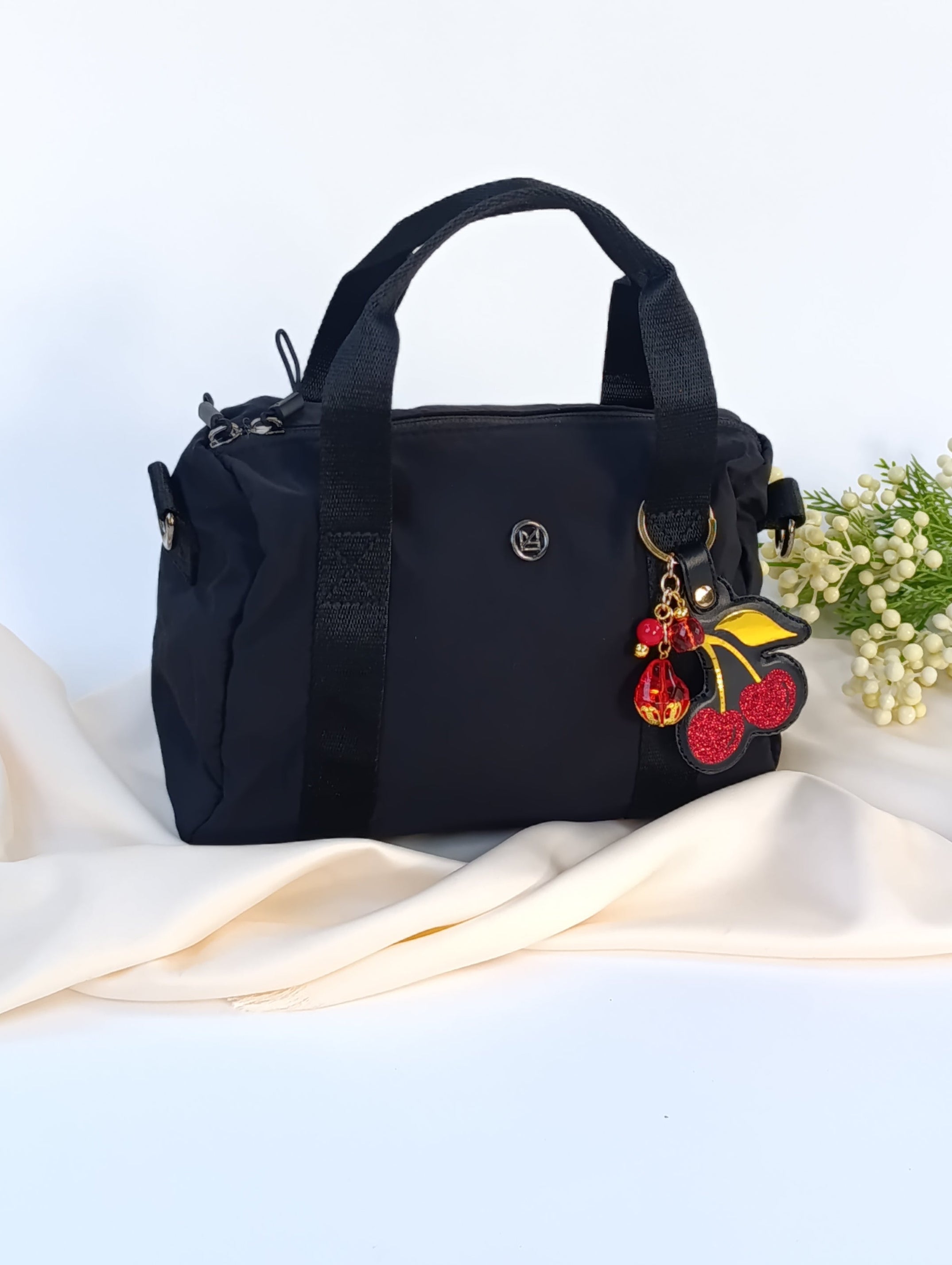 Minibag impermeable con Charm Cherry