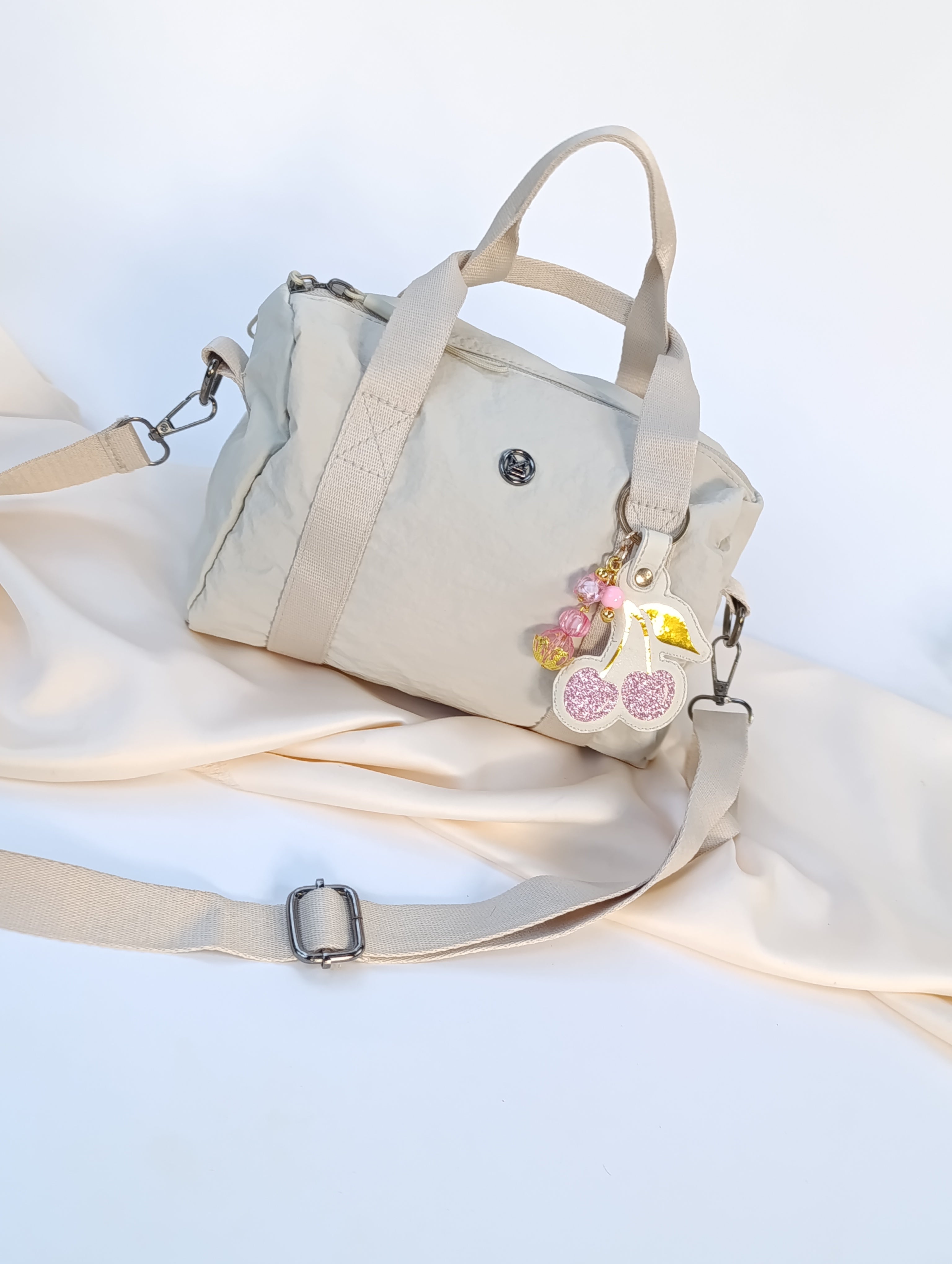 Minibag impermeable con Charm Cherry