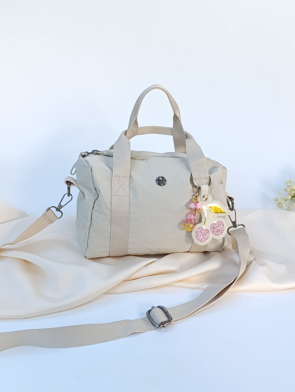 Minibag impermeable con Charm Cherry